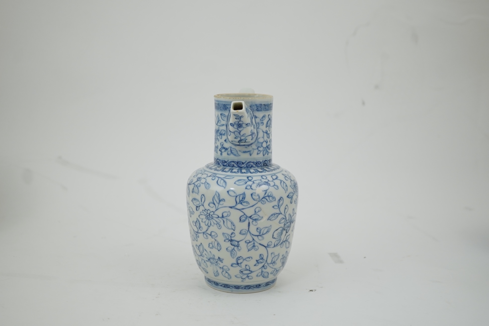 A Chinese blue and white ewer, Hongzhi mark, probably Qing dynasty